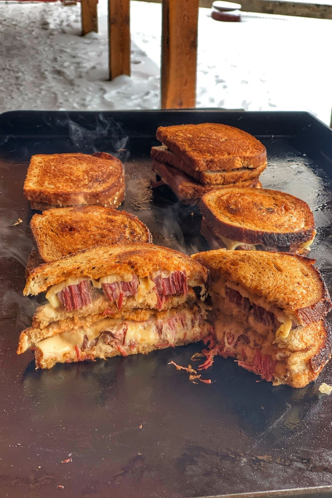 Reuben sandwich made with leftover ranch-raised corned beef, Swiss cheese, sauerkraut, and Thousand Island dressing — featured with HeyGrillHey’s corned beef recipe.